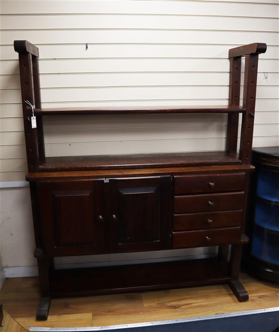 An oak cheese press bookcase fitted cupboards and drawers W.150cm